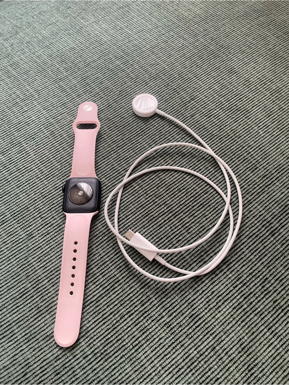 Apple Smartwatch with Light Pink Sport Band and White Charger